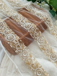 some white and gold ribbons on a table