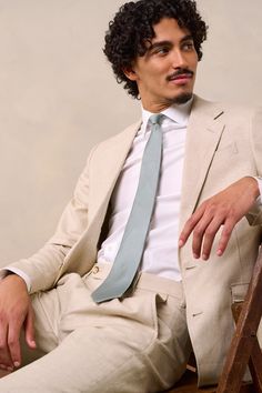 The perfect suit for summer wedding - Tan, linen suit for summer 

Crafted from a tan linen and cotton fabric with an unlined jacket to keep things breezy. 

53% Linen, 47% Cotton
Unlined
Patch pockets with flap
Two-button closure
Notch lapels
Side vents
Single pleated pants
Belt loops Timeless Beige Linen Suit, Tailored Beige Linen Suit, Tailored Beige Suit For Spring, Tailored Beige Spring Suit, Beige Suits For Business In Spring, Tailored Summer Suits For Business Casual, Tailored Summer Business Casual Suits, Summer Tailored Business Casual Suits, Spring Beige Tailored Suit