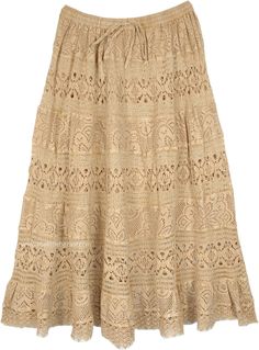 An ever-going classic lace style in a camel beige shade, this is a long skirt with an eclectic fabric style and a fresh look.  This enticing floral lace skirt has been made entirely from rayon lace (top layer), and has an inner lining in plain cotton. #tlb #Lace #TieredSkirt #vacationclothing #Floral #bohemianfashion #Laceskirt #Beigeskirt #Weddingskirt Lace Skirt With Lace Work, Beige Lace Skirt With Lace Patchwork, Beige Lace Trim Skirt For Spring, Beige Skirt With Lace Trim For Spring, Beige Long Skirt With Lace Trim, Flowy Lace Maxi Skirt For Beach, Lace Maxi Skirt For The Beach, Beige Flowy Lace Skirt, Beige Lace Long Skirt