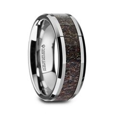 the men's wedding band is made with wood and silver inlays