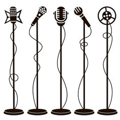 four microphones with musical instruments on them