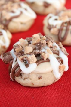 frosted toffe cookies with chocolate chips and marshmallows in the middle