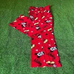 Disney Mickey Mouse Plushy flannel Red Sleepwear Lounge Pajama Pant Size M

The Disney Mickey Mouse Plushy Flannel Red Sleepwear Lounge Pajama Pants in Size M bring a fun and nostalgic touch to your loungewear. These ultra-soft plush flannel pants feature a playful Mickey Mouse print on a vibrant red background, perfect for cozy nights and lazy days. With an elastic waistband for a comfortable fit, these pajama pants are both stylish and practical, making them a must-have for Disney fans. Disney Holiday Pajamas, Red Sleepwear, Mickey Mouse Print, Flannel Pants, Mouse Print, Lounge Pajamas, Pajama Pant, Lazy Days, Sleepwear Robe