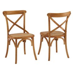 two wooden chairs sitting next to each other