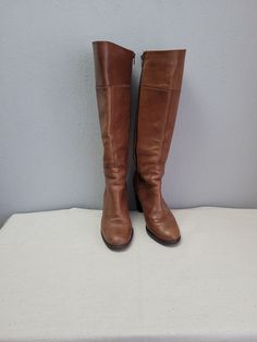 Vintage brown leather tall knee boots for women. Sides zippers and block heels. Round toes. Made in Italy. Lining - leather inside. Lavorazione Artigiana  condition: used, normal vintage condition. Some signs of use.  measurements: Heels height 8.5 cm / 3.3" in Outsole length 28 cm / 10.9"in total height with heel 49 cm / 19.1 in bootleg top circumference 39 cm / 15.2" in bottom sole width in widest place 8,7 cm / 3.4" in SIZE: EU 39  - labeled size; US 8 Vintage Brown Boots With High-quality Finish, Brown Leather Snip Toe Knee-high Boots, Tall Brown Leather Boots, Brown Medium Width Calf Leather Knee-high Boots, Brown Knee-high Heeled Boots With Buckle Closure, Brown Knee-high Moto Boots Medium Width, Tall Leather Boots, Slouched Boots, Tall Boots