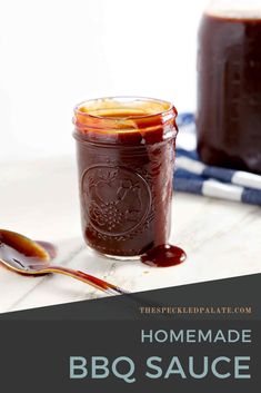 homemade bbq sauce in a jar with spoon