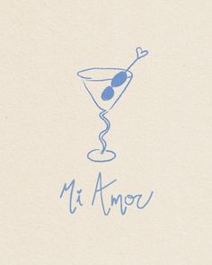 a drawing of a martini glass with an olive in it and the word mi amo written below