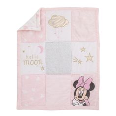 a pink and white mickey mouse blanket with the words hello moon in gold on it