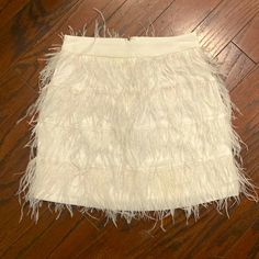 Gianni Bini White Feather Mini Skirt Size Xs This Is A True Size Xs Does Not Have Stretch Spring Mini Skirt With Feather Trim, Chic Feathered Summer Skirt, Feathered Mini Skirt For Summer, Spring Fitted Feather Skirt, Spring Mini Skirt With Feathers, Summer Mini Skirt With Feathers, White Feather Skirt, Feather Mini Skirt, Black Sequin Shorts