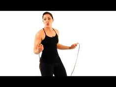 a woman holding a jump rope in her right hand