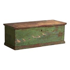 an old green chest with birds painted on the front and sides, sitting against a white background