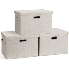 three storage bins with handles on each side and two smaller ones in the middle