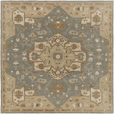 a blue and beige rug with an intricate design