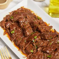 a close up of a plate of food with meat