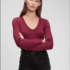 New With Tags Gap Modern V-Neck Long Sleeve T-Shirt Color: Secret Plum Purple Fitted Silhouette Hugs Your Curves. Hits At The Hip. Finely Ribbed Supima-Modal Blend. Long Sleeves. V-Neck. #905050 58% Cotton, 39% Modal, 3% Spandex Machine Wash. Imported. J Crew Banana Republic Athleta Lululemon Lilly Pulitzer James Perse Plum Aubergine Trendy V-neck T-shirt For Fall, Trendy Stretch Tops By Gap, Trendy Stretch Tops From Gap, Gap Tops For Spring Layering, Gap Fitted Tops For Fall, Gap Crew Neck Tops For Fall, Trendy Long Sleeve Tops By Gap, Trendy Long Sleeve Tops From Gap, Red V-neck Top For Layering