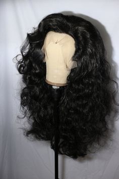 Transform your look with this ultimate black lace front wig, designed for maximum drama. Featuring super-thick, voluminous waves and a flawless lace front for a natural hairline, this wig adds a touch of elegance to any performance or event. With its rich jet-black color and versatile styling options, you can create a range of stunning looks. Handcrafted for comfort and impact, this wig ensures you stand out in style. Shop now and elevate your glam game! Custom orders available for a personalize Drag Wigs, Jet Black Color, Black Wig, Wig Making, Synthetic Lace Front Wigs, Costume Hats, Cosplay Wigs, Jet Black, Costume Accessories