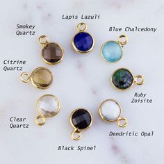 Tiny Round Gemstone Charm 6-7mm bezel Approx. 6mm gemstone Color and size will vary Available in clear quartz, black spinel, blue chalcedony, smokey quartz, lapis lazuli,ruby zoisite, citrine quartz and dendritic opal Priced per 5, 10, 15, 20, 25 or 50 pieces Dendritic Opal, Ruby Zoisite, Small Charms, Black Spinel, Blue Chalcedony, Smokey Quartz, Clear Quartz, Metal Chain, Gemstone Colors