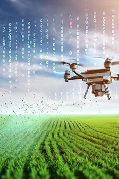 a large white and black remote control flying over a green field with numbers coming out of it