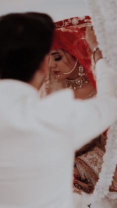 the bride is getting ready to walk down the aisle