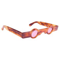 Seldom Vintage Rare Alain Mikli 1989 AM89 Tortoise Havana sculptured frame. Medium Pink lenses. Please consider that this item is nearly 40 years old so it could show minor sign of wear due to storage. Made in France Front 13.5 Cms Lens Height 2 Cms Lens Width 2 Cms Temples 14 Cms Pink Lenses, Black Confetti, Alain Mikli, Cartier Panthere, Rubber Bracelets, Bracelet Love, Shield Sunglasses, Studded Belt, Crazy Colour