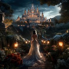 a woman standing in front of a castle at night with lanterns on the ground and flowers all around her