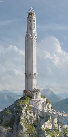 a large white tower on top of a mountain