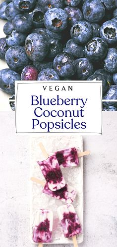 blueberry coconut popsicles on a white plate