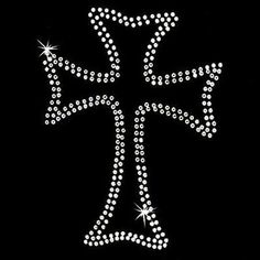 a cross made up of white diamonds on a black background with the word jesus written in it