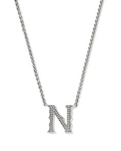 The beloved letter necklace style meets the charm of the Lone Star State in the Beau Letter N Pendant Necklace in Vintage Silver. Crafted in vintage-inspired metal, this pendant’s etched script is a play on our signature hoofprint detailing. Whether you’re showing off your initials or someone else’s, this style will be hard to ignore. This necklace is a part of Yellow Rose by Kendra Scott—a brand that celebrates ranch life with Kendra Scott staples alongside select curated jewelry pieces and acc Silver Kendra Scott, Hoof Print, Sold Out Sign, Lone Star State, Letter N, Ranch Life, Letter Necklace, Lone Star, Yellow Roses