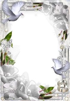 a white frame with flowers and two doves on it, as well as a bell