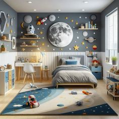 a child's bedroom decorated in blue and white with stars on the wall, moon and rocket ship