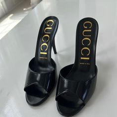 Gucci Patent Calfskin High Heel Slides 38.5 Black, Never Worn Try On Sole Mark, Gorgeous Timeless Shoe Gucci Leather Heels With 4-inch Heel, Designer Patent Leather Slip-on Heels, Classic Gucci Leather Heels, Luxury Slip-on Heels For Evening, Gucci High Heel Calf Leather Heels, Gucci Leather Slip-on Heels, Luxury Patent Leather Heels With Branded Insole, Gucci Luxury Slip-on Heels, Chic Gucci Heels With Reinforced Heel