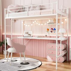 a white bunk bed sitting in a bedroom next to a pink desk and chair on top of a hard wood floor