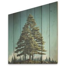 a wooden wall hanging with a painting of a pine tree on it's side