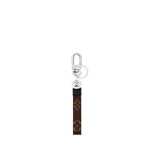 Products by Louis Vuitton: Monogram Slim Dragonne Bag Charm And Key Holder Louis Vuitton Official, Leather Silver, Classic House, Strap Tops, Key Holder, Monogram Canvas, Slime, Leather Trims, Louis Vuitton Monogram