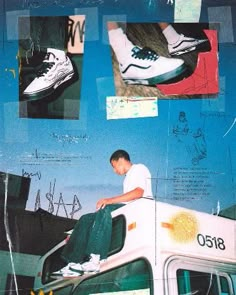 a man sitting on top of a white van with his feet up in the air