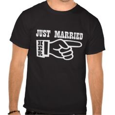 a man wearing a t - shirt that says just married he's pointing at the camera