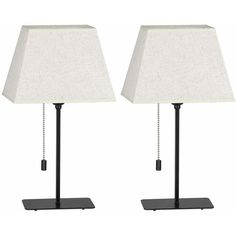 pair of black metal table lamps with white linen shades on each lamp and chain at the base