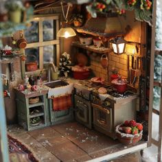 a dollhouse kitchen with lots of furniture and decorations