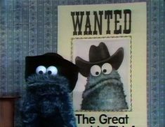 the sesame street show has an image of oscar and cookie monster in front of a wanted poster