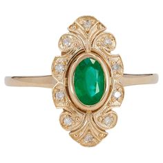 14 k solid gold ring with natural emerald and diamonds. May birthstone ring. 14k solid gold Total weight: 3.4 g. depends from size Natural gemstones (all are tested by professional gemmologist): Emerald: oval cut, weight - 0.70 ct, transparent with inclusions, green color Diamonds: 10 pieces x 0.01 ct - 0.10 ct total, H/ SI, round brilliant cut. Vintage Emerald Engagement Rings, Gold Ring With Emerald, Mens Emerald Rings, Emerald Promise Ring, Emerald Gold Ring, Emerald Engagement Rings, Vintage Gold Ring, Art Deco Emerald Ring, Art Deco Emerald