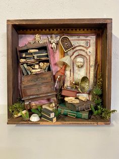 an old wooden box filled with books and other items