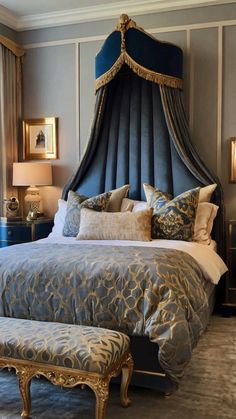 a bed with blue and gold decor in a bedroom