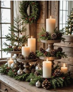 christmas decorations with candles and pine cones