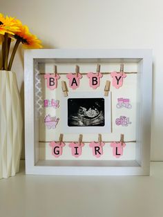 Baby Girl or Baby Boy Shadow Box Picture Frame is an adorable gift for baby shower or expecting parents.  Frame Size: 10 x 10 x 2 inches (25x25x4.5cm) Frame will fit the photo of approximate size 3.5x2.5 inches or 7x9cm  (standard ultrasound picture). Shadow box frame opens from the back so you can insert your picture. You can choose option for baby girl with pink onesies or option for baby boy with blue onesies and specify what words you want in your frame  for example: Baby Boy, It's a Girl, B Shadow Box Gender Reveal Ideas, Ultrasound Shadow Box Ideas, Shadow Box Gender Reveal, Gender Reveal Shadow Box Ideas, Ultrasound Frame Ideas, Baby Picture Frames Diy, Newborn Shadow Box, Boy Shadow, Picture Shadow