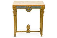 a small table with a marble top and gold trimmings on the bottom, sitting against a white background