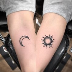 two sun and moon tattoos on both legs