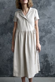 Beige Wrap Dress With Tie Waist, Beige Summer Wrap Dress, Summer Linen Dress With Surplice Neckline, Beige Short Sleeve Wrap Dress, Spring Linen Dress With Surplice Neckline, Casual Linen V-neck Wrap Dress, Linen Dress With Tie Waist And Short Sleeves, Beige Linen V-neck Dress, Beige Short Sleeve Dress With Tie Waist