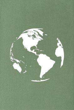 an image of the earth in white on green paper