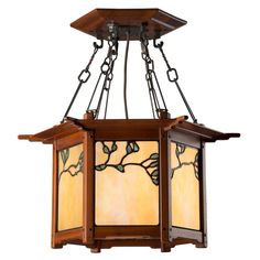 a hanging light fixture with stained glass panels